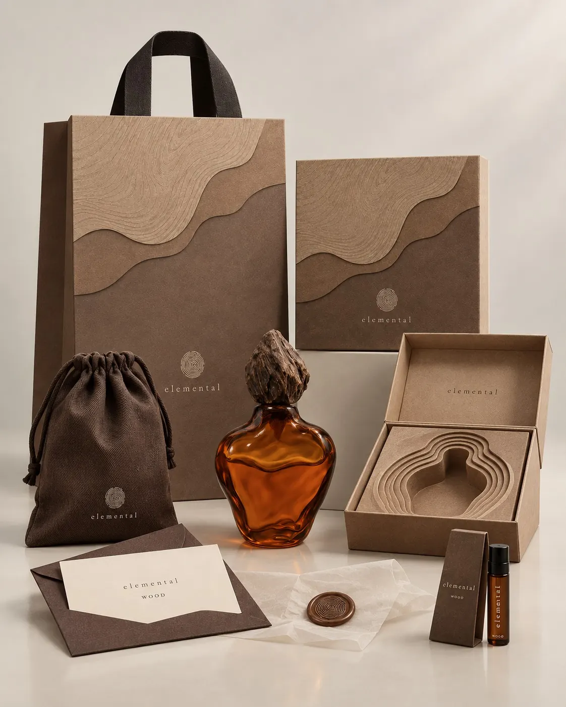 The Elemental WOOD collection laid out: bag, box, bottle, pouch, card and travel vial