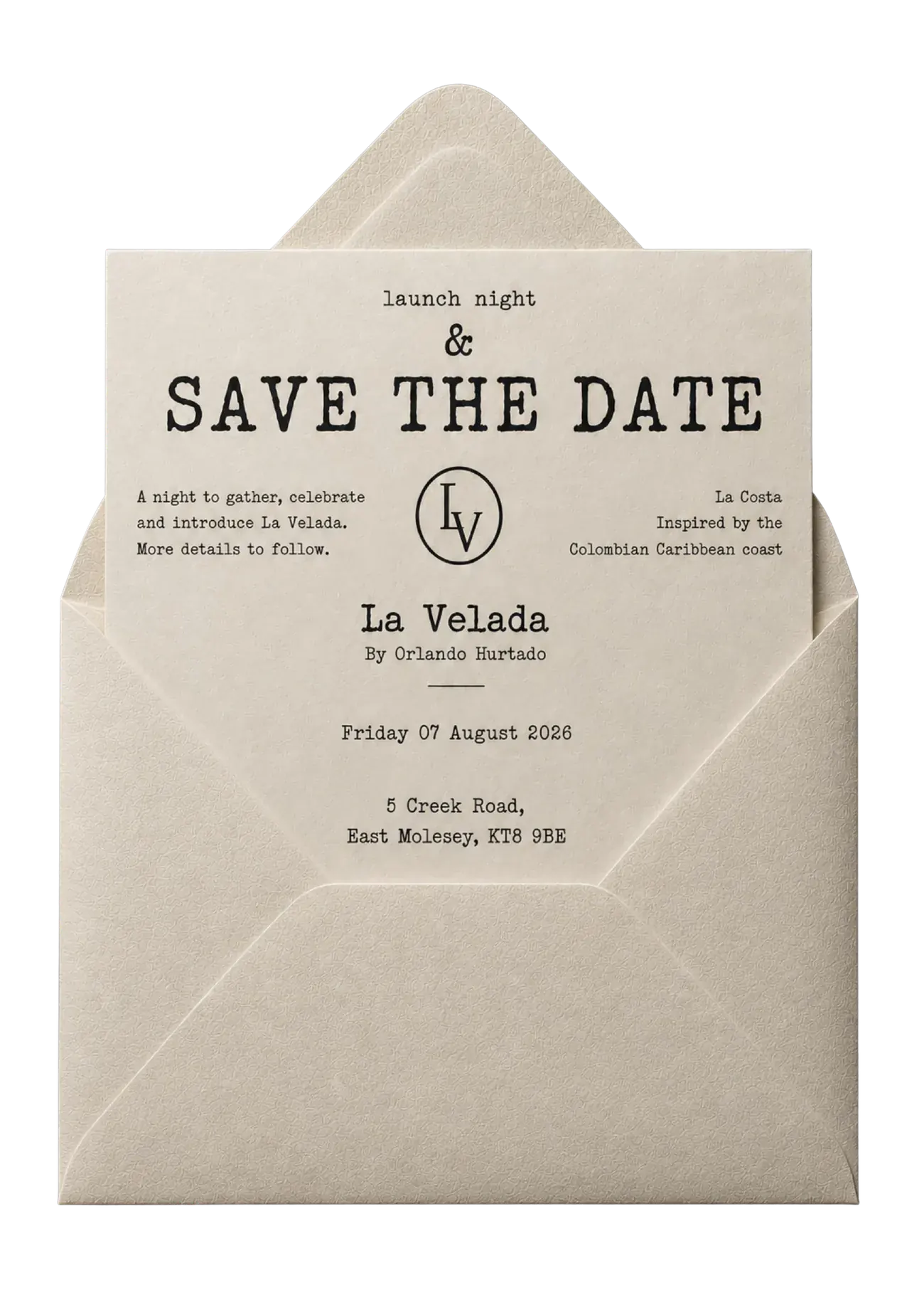 La Velada save the date card half out of its envelope